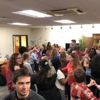 Spanish students practicing Dominican dance moves in the Language Resource Center